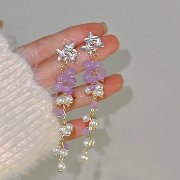 Popular small and fresh butterfly and flower stud earrings in spring 2025. Light luxury and versatile long tassel pearl earrings and ear accessories.