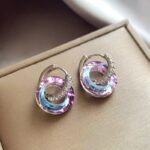 New style double-ring spliced earrings for women in 2025, small niche and high-class iridescent crystal stud earrings, personalized, simple and versatile.