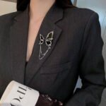 New-style French light luxury butterfly brooch with tassels, a unique and elegant accessory for blazers, sweaters, etc.