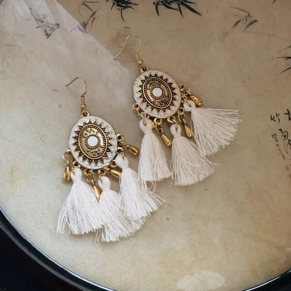 Multiple style links: Bohemian Droplet Feather Seed Bead Tassel Earrings with Minority Ethnic Style Ear Hook, Light Luxury Resort Style Earrings with Temperament.