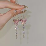 Sweet and delicate zircon inlaid diamond butterfly tassel romantic earrings, ear clips, studs, and eardrops.