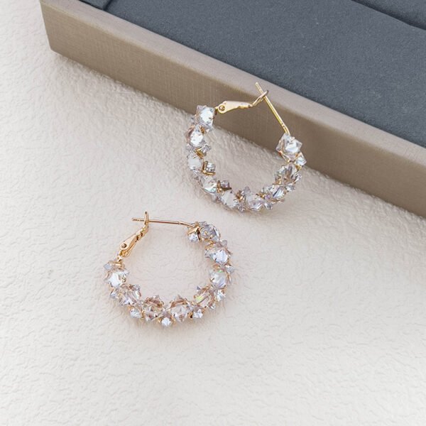 Super sparkly crystal ear loops. These are luxurious, fashionable, versatile, and have a niche and high - end feel. They are Korean - style creative earrings.