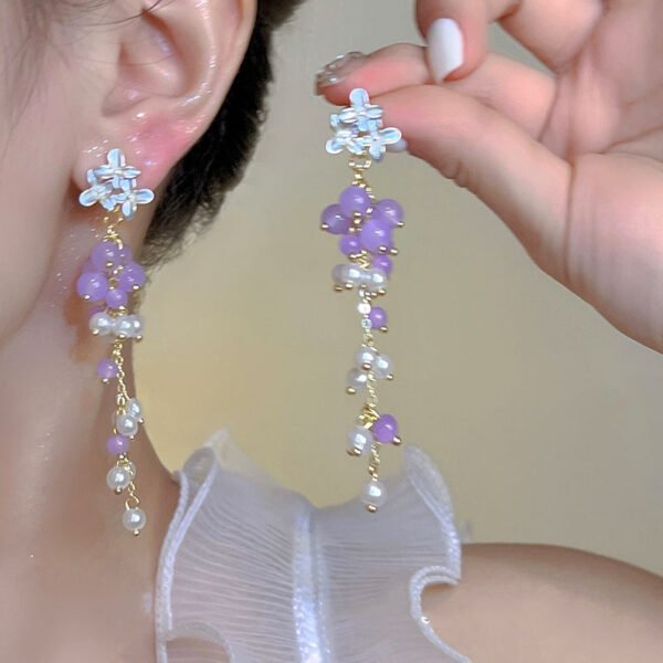Popular small and fresh butterfly and flower stud earrings in spring 2025. Light luxury and versatile long tassel pearl earrings and ear accessories.