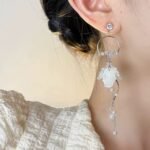 Women's super-fairy long petal pearl tassel earrings, minimalist, luxurious, niche design with a sense of high-class and elegance.