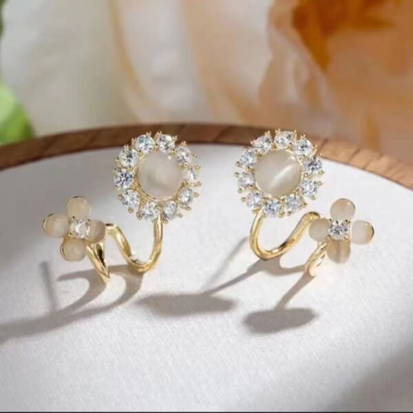 Light luxury, fashionable and high - end cat's eye stone flower earrings, new summer style with niche design and delicate stud earrings