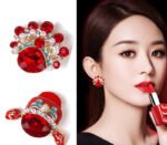 International-style Peking Opera female warrior facial makeup-inspired Chinese trendy earrings for women, red ear drops, new style in 2025, high-class pearl stud earrings