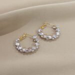 Super sparkly crystal ear loops. These are luxurious, fashionable, versatile, and have a niche and high - end feel. They are Korean - style creative earrings.