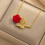 Cross-border French romantic red rose titanium steel necklace for women. A wine-red and elegant necklace with a flower pendant slightly inlaid with zircon, suitable as a collarbone chain.