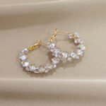 Super sparkly crystal ear loops. These are luxurious, fashionable, versatile, and have a niche and high - end feel. They are Korean - style creative earrings.
