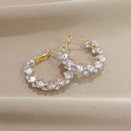 Super sparkly crystal ear loops. These are luxurious, fashionable, versatile, and have a niche and high - end feel. They are Korean - style creative earrings.