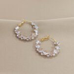 Super sparkly crystal ear loops. These are luxurious, fashionable, versatile, and have a niche and high - end feel. They are Korean - style creative earrings.