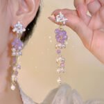 Popular small and fresh butterfly and flower stud earrings in spring 2025. Light luxury and versatile long tassel pearl earrings and ear accessories.
