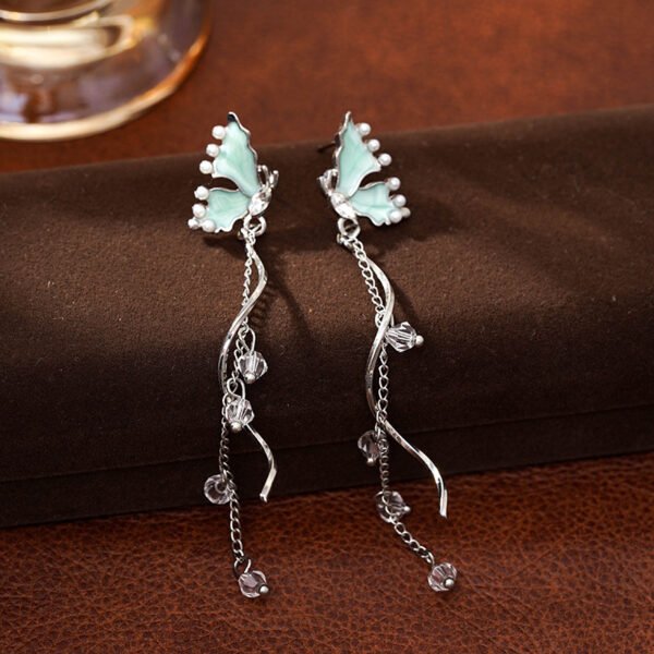 Women's stud earrings, light luxury, niche design, high - end feeling. Super - fairy long butterfly tassel earrings and ear ornaments.