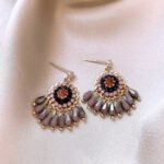 New popular purple synthetic crystal tassel stud earrings in the 2025 style, featuring a unique ethnic and vintage design with a niche aesthetic.
