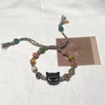 Cartoon and childlike big-eyed cat ceramic beaded bracelet with a niche design sense, a trendy and high-class bracelet for girlfriends.