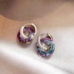 New style double-ring spliced earrings for women in 2025, small niche and high-class iridescent crystal stud earrings, personalized, simple and versatile.