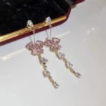 Sweet and delicate zircon inlaid diamond butterfly tassel romantic earrings, ear clips, studs, and eardrops.