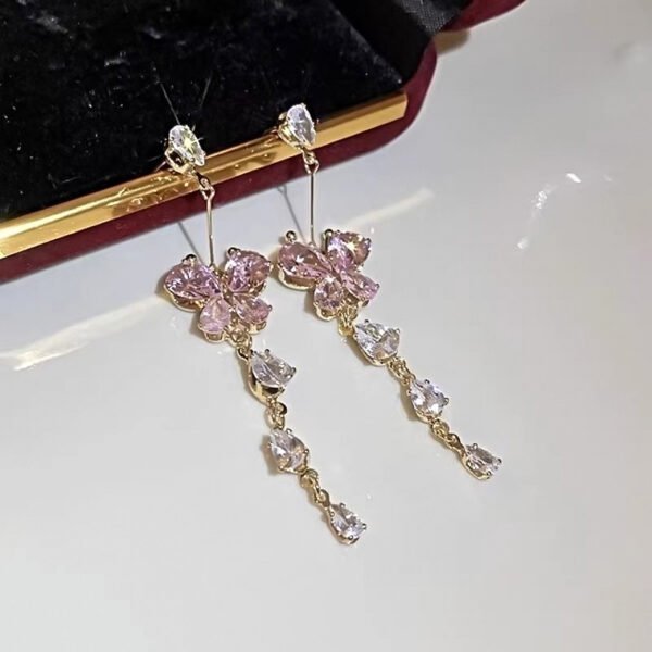 Sweet and delicate zircon inlaid diamond butterfly tassel romantic earrings, ear clips, studs, and eardrops.