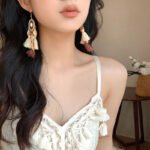 Multiple style links: Bohemian Droplet Feather Seed Bead Tassel Earrings with Minority Ethnic Style Ear Hook, Light Luxury Resort Style Earrings with Temperament.