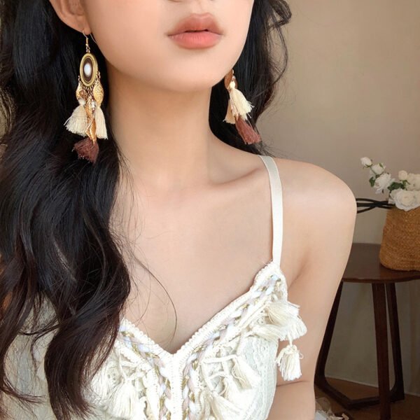 Multiple style links: Bohemian Droplet Feather Seed Bead Tassel Earrings with Minority Ethnic Style Ear Hook, Light Luxury Resort Style Earrings with Temperament.