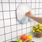 Foldable pot lid rack, wall-mounted storage rack, punch-free and adjustable, used for placing pot lids and cutting boards in the kitchen.
