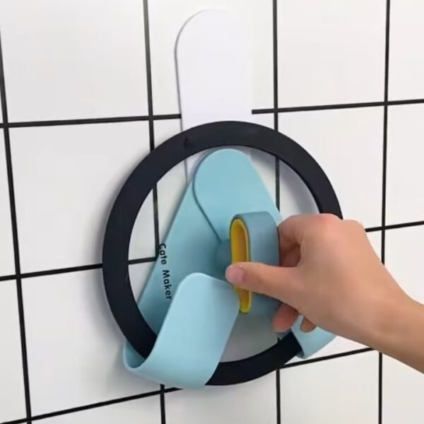 Foldable pot lid rack, wall-mounted storage rack, punch-free and adjustable, used for placing pot lids and cutting boards in the kitchen.